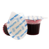 Side view of Elements Communion prefilled juice cup with gluten-free wafer lid