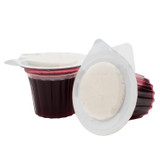 Single Elements Communion cup with wafer positioned beside grape juice compartment