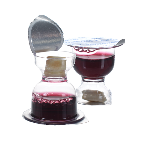 WCC Chalice Communion prefilled communion cup with Concord grape juice and gluten-free bread, lid partially opened