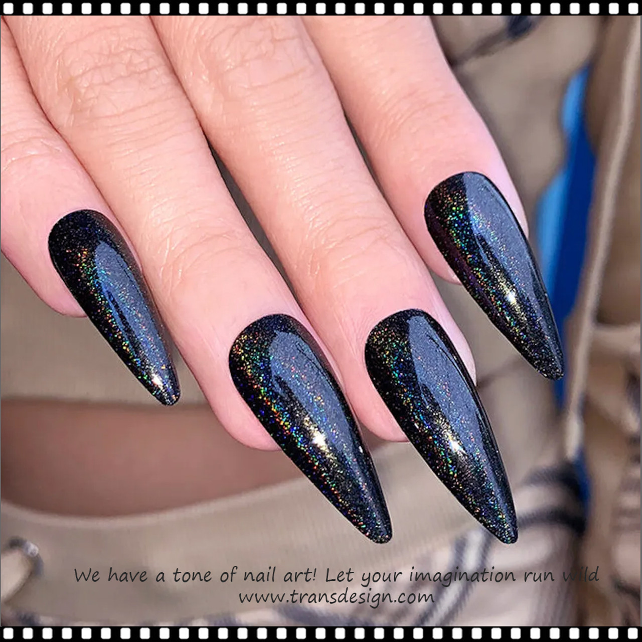 Aurora pigment and Swarovski crystals sculpted gel stiletto nails