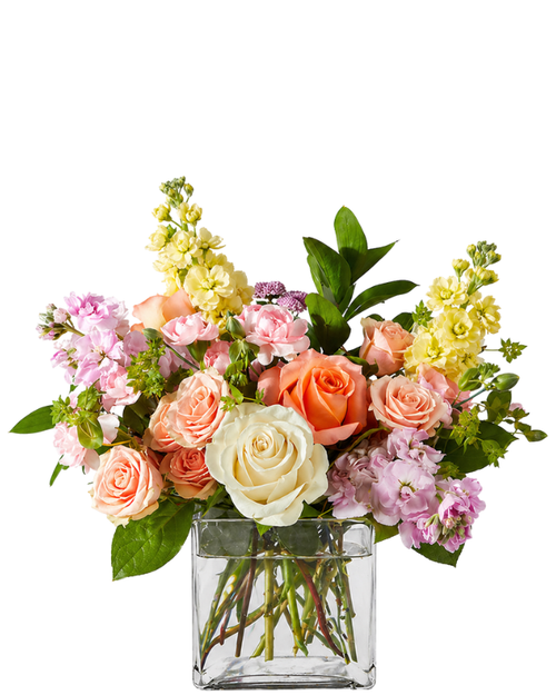 Sunday Blush pastel rose arrangement with pink and yellow stock in a clear cube vase in Phoenix Arizona