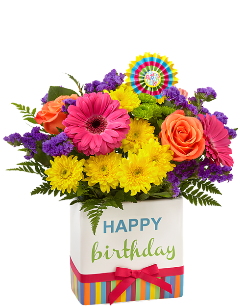 Birthday Burst floral arrangement with orange roses, pink gerbera daisies, yellow mums, and purple statice in Phoenix Arizona