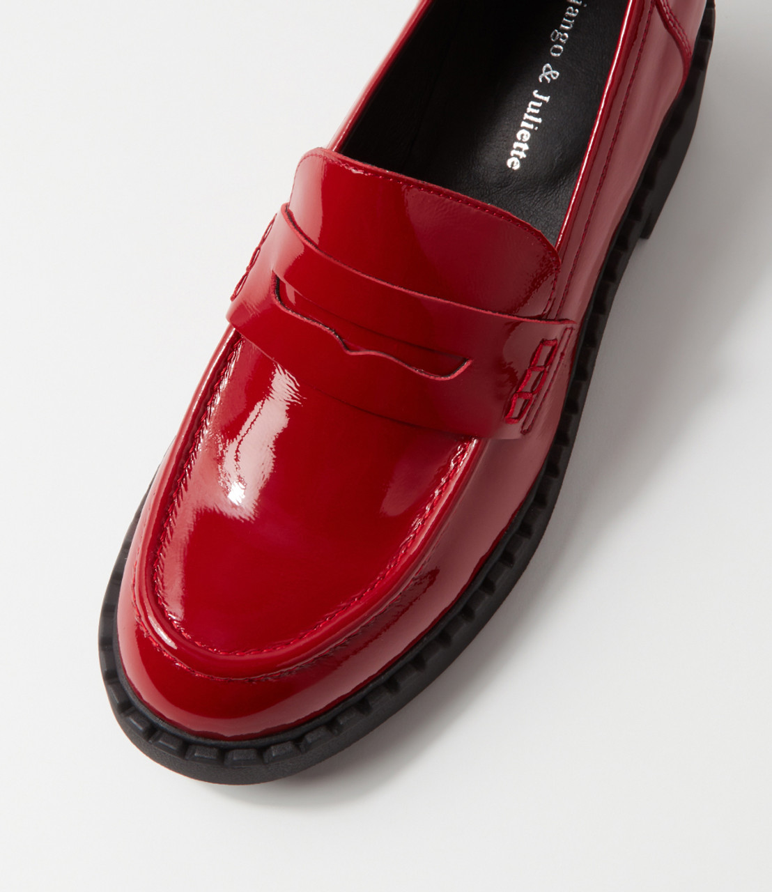 Red patent store leather penny loafers