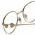 Close Up View of Chopard VCHC52S-0300 Designer Progressive Lens Prescription Rx Eyeglasses in Shiny 23KT Gold Plated/Black/Heart Gemstone Accent Ladies Round Full Rim Metal 51 mm