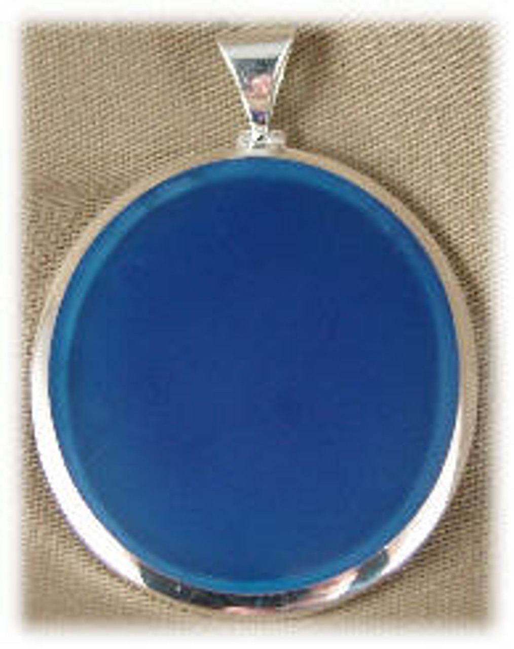 HS-304BLU: Oval Blue Onyx Pendent mounted in Sterling Silver, 1-1/2" wide x 1-3/4" long.