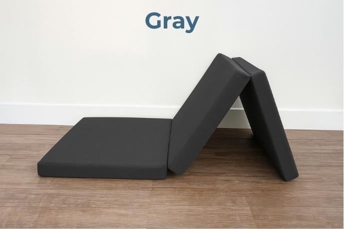 Tri-Fold Foam Mattress, gray foldable foam mattress in a tri-fold design for versatile sleeping or lounging.