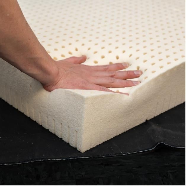 Organic Latex Foam Upholstery Sheet, close-up view showing the soft, textured surface and thick, supportive edges of the foam sheet.