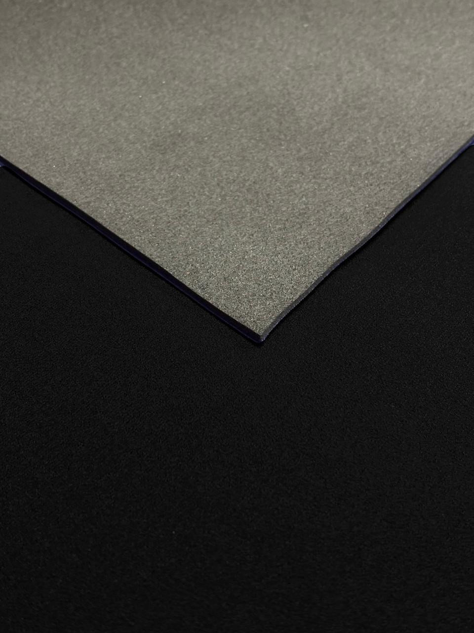 1.5mm Neoprene Sheet, product image showing the front plain rubber side and the back black nylon side.