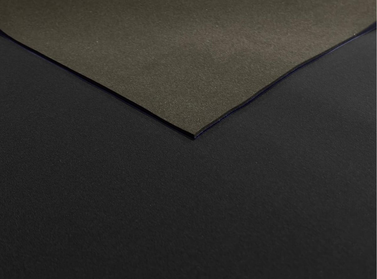 1.5mm Neoprene Sheet - Front: Plain Rubber, Back: Black Nylon, close-up image showing the texture and layered material of the neoprene sheet.