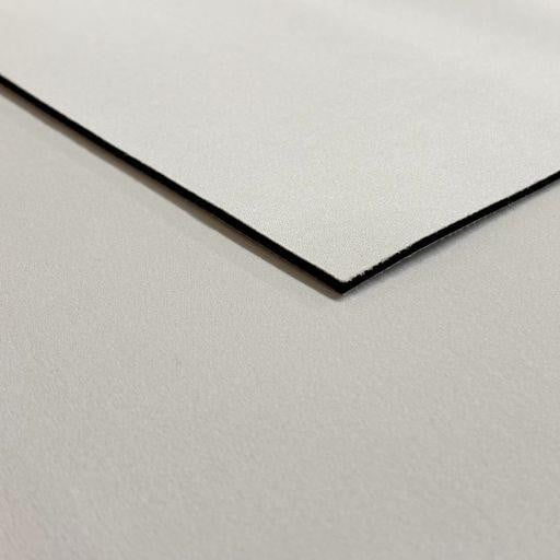 3mm Neoprene Sheet, front side with polyester backing and back side with polyester coating, suitable for various insulation and craft applications.