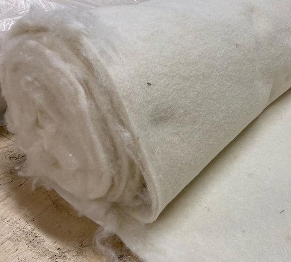 Organic Wool Felt or Needlepunch, rolled and unrolled natural wool felt fabric for craft and industrial use.