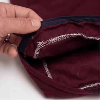 Overlocked inside fabric edges preventing unraveling