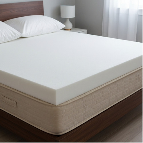 Foam mattress topper on a bed in a modern bedroom