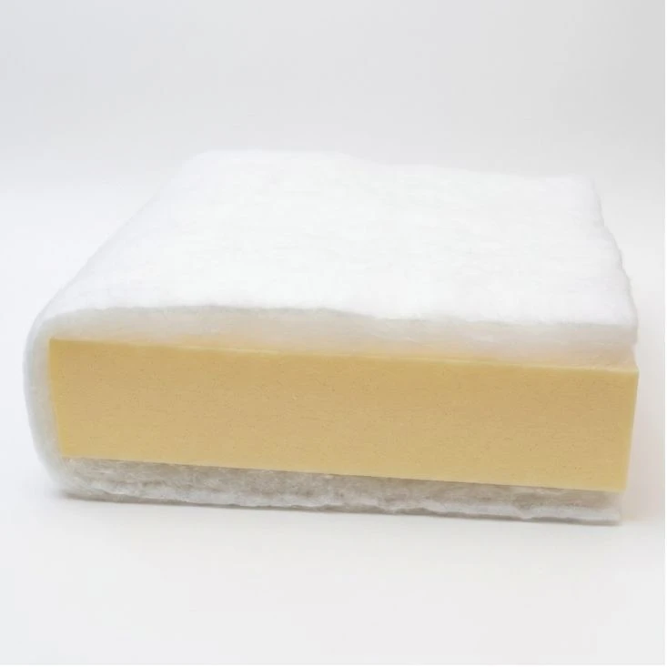 Foam core wrapped in polyester batting (Dacron)