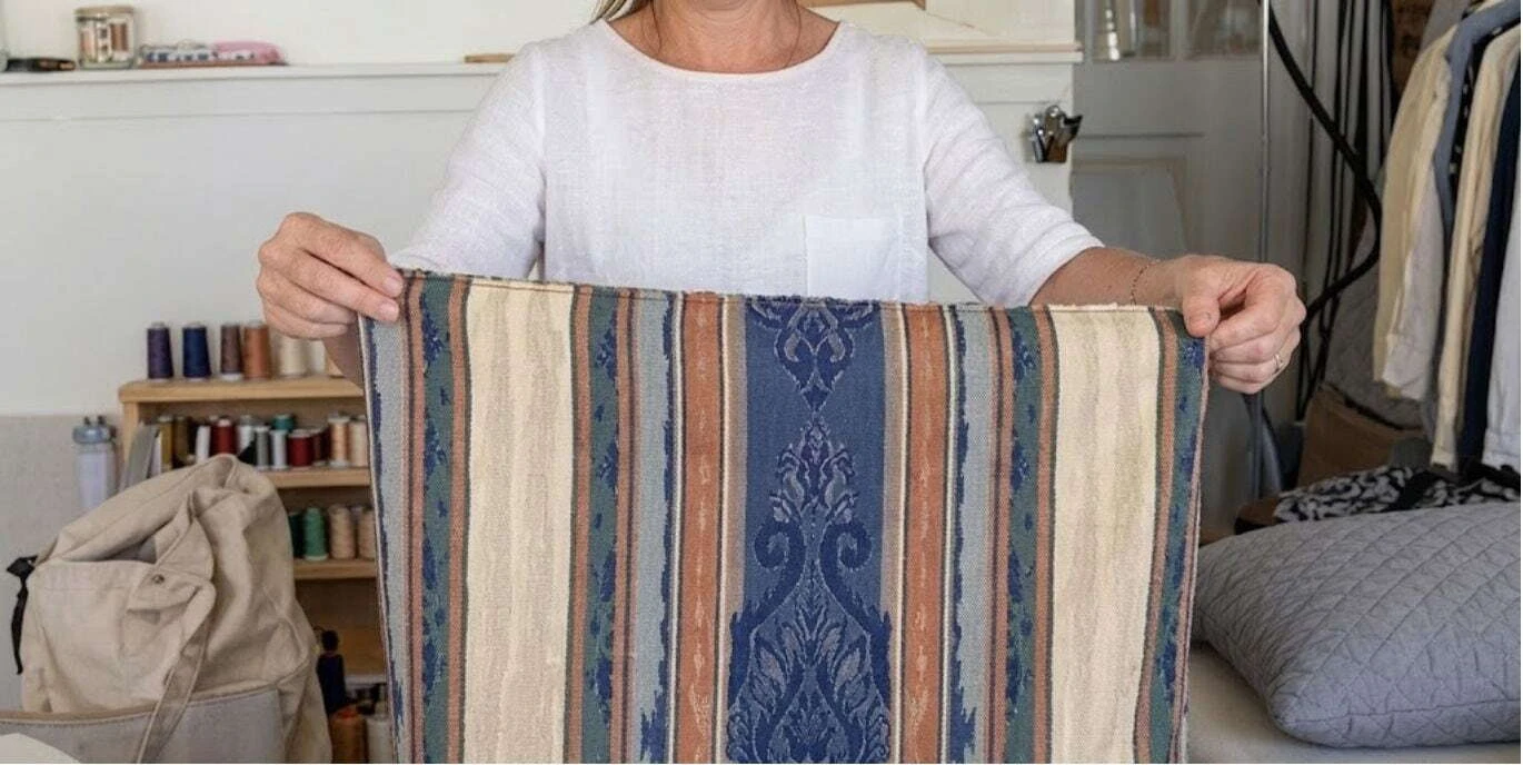 Measuring cushion thickness seam to seam with a tape measure