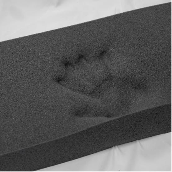 Memory foam with a hand impression