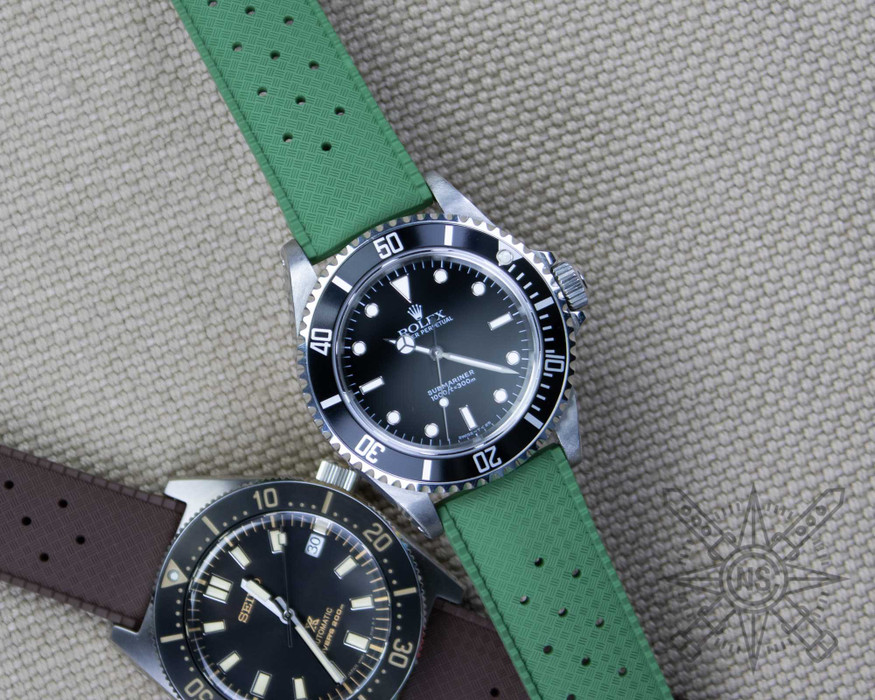 Rolex Submariner on a green vintage tropical style rubber watch strap