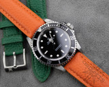 Orange leather watch band on a rolex submariner Orange leather watch band on a rolex submariner