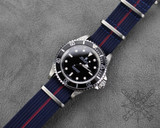 Navy and red nylon watch strap on a Rolex Submariner