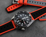 Orange and black silicone watch strap