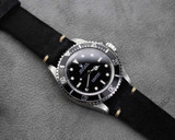 Black suede vintage watch band on a Rolex Submariner Black suede vintage watch band on a Rolex Submariner