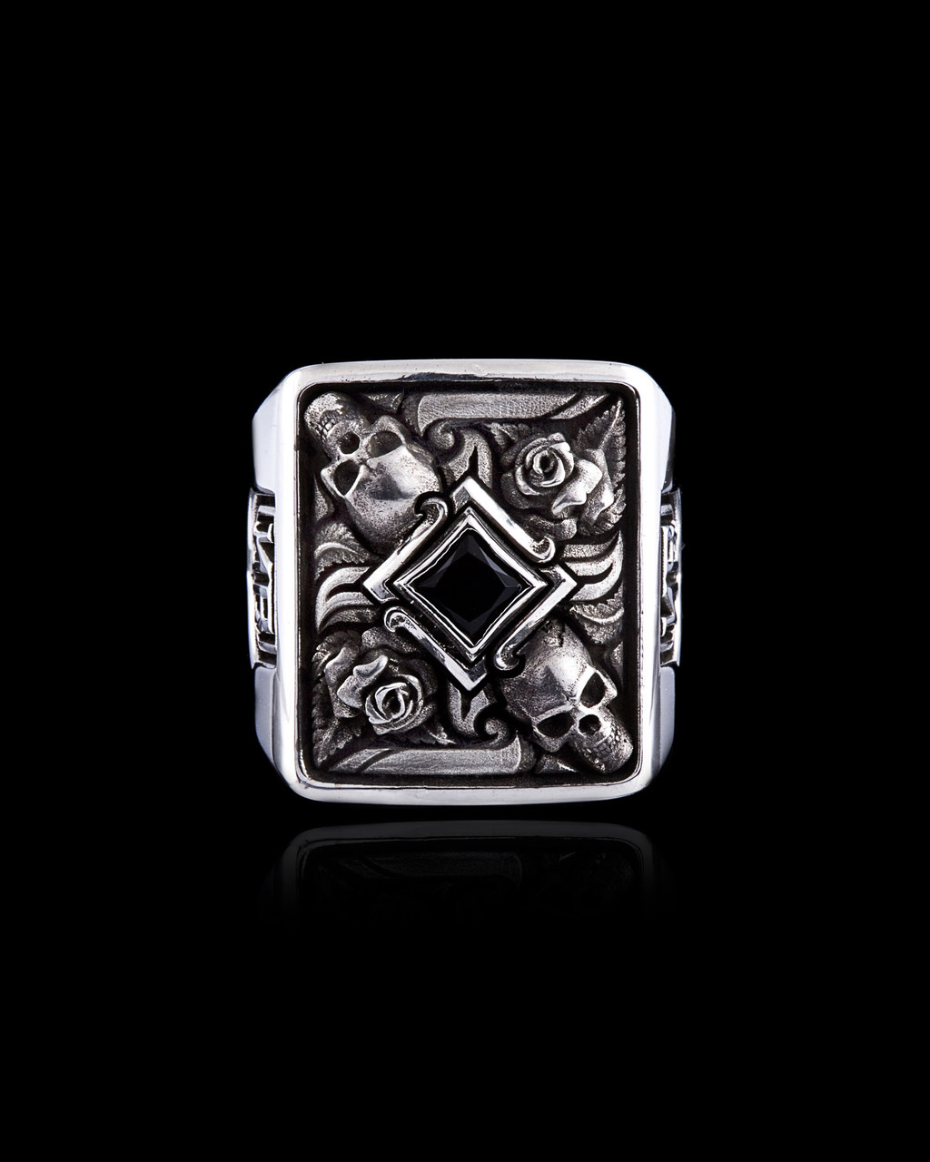 Till Death Do Us Part Ring with Skulls and Roses Around a Black Onyx Gemstone by NightRider Jewelry - Top View Till Death Do Us Part Ring with Skulls and Roses Around a Black Onyx Gemstone by NightRider Jewelry - Top View