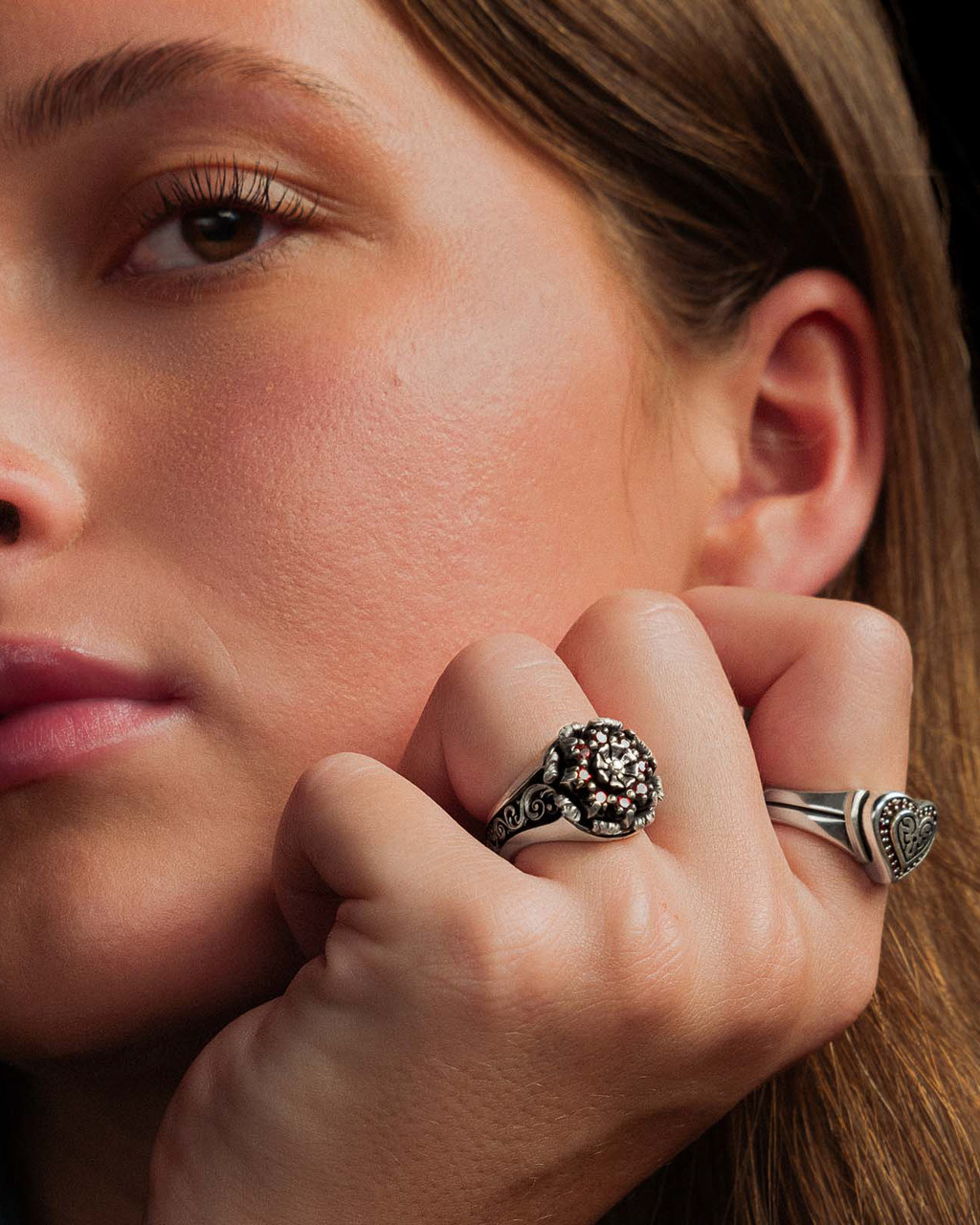 Grace Women's Sterling Silver Flower Ring with Red Garnet by NightRider Jewelry shown on model Grace Women's Sterling Silver Flower Ring with Red Garnet by NightRider Jewelry shown on model