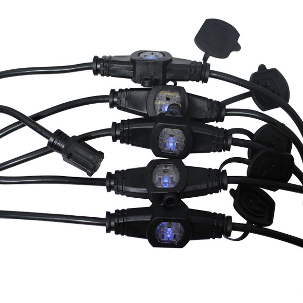 Close-up of ProX locking power connectors with weatherproof sealing caps designed for secure outdoor electrical connections.