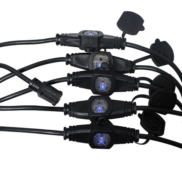 Close-up of ProX locking power connectors with weatherproof sealing caps designed for secure outdoor electrical connections.