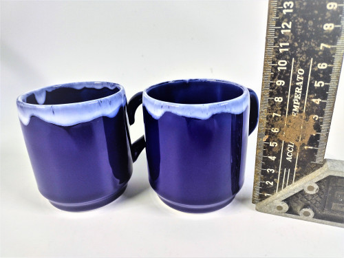 2 small mugs glazed in cobalt blue 
