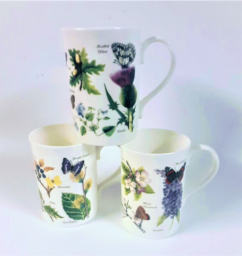 A set of 3 Bone china mugs with wild  flowers & butterfly design