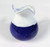 medium size jug glazed in cobalt blue with white top 