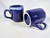 Two small coffee mugs glazed in cobalt blue with white rim 