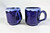 Two small coffee mugs glazed in cobalt blue with white rim 