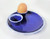 Double egg cup on a plate glazed in cobalt blue pottery