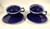 Set of 2 large continental size cups  and saucers glazed in blue with white top