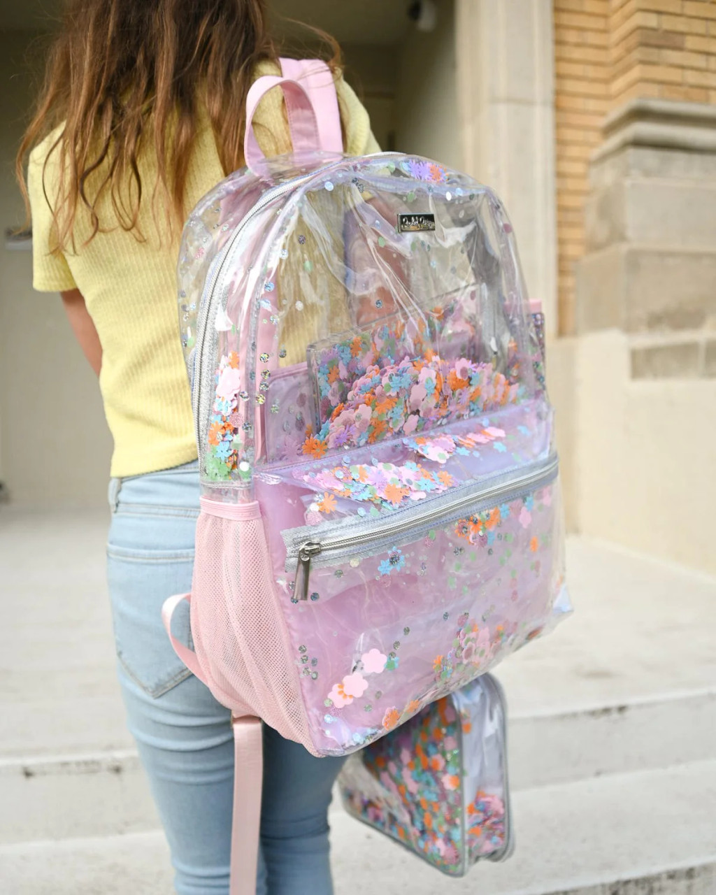 https://cdn11.bigcommerce.com/s-e79p8f/images/stencil/1280x1280/products/20514/50717/flower_confetti_backpack_2__44181.1687877669.jpg?c=2