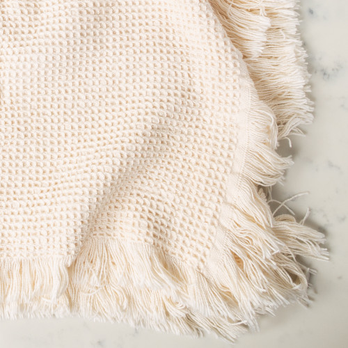 Throw Blanket by Covered in Cotton 