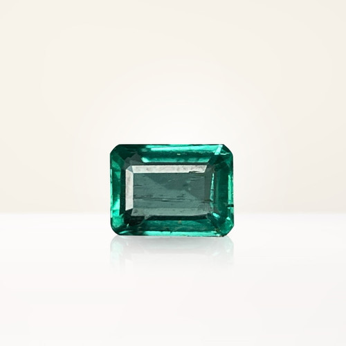 1.31 ct Emerald Cut Green Emerald - Nolan and Vada