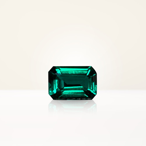 0.88 ct Emerald Cut Green Lab Emerald - Nolan and Vada