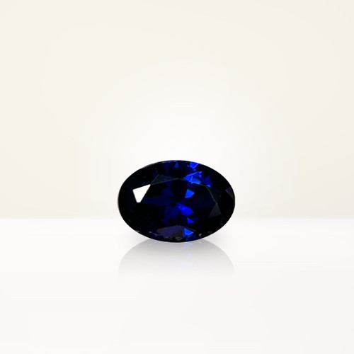 0.95 ct Oval Blue Lab Sapphire - Nolan and Vada