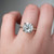 S826-CELINE-WG-NVST550 - Ring on Hand