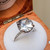 Adele - 5.09 Cts Round White Sapphire Engagement Ring - Nolan and Vada