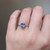 S810-ZOE-WG-NVST3294 - Ring on Hand