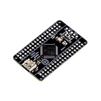 Angled shot of STM32G0B1RET6 board highlighting MCU, buttons, USB, and header pins