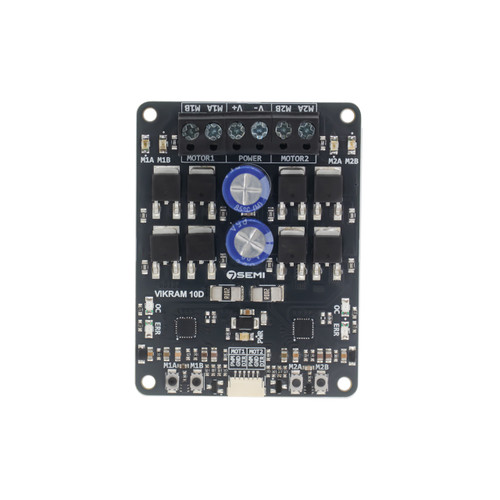 Front view of 7SEMI VIKRAM-3010D 10A dual channel DC motor driver board showing power capacitors and motor terminals