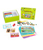 Inferencing Chipper Chat, educational card game with colorful cards, tokens, dice, and a game box for children to develop inference and association skills.