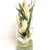 Glass cylinder vase filled with white oriental lilies.
