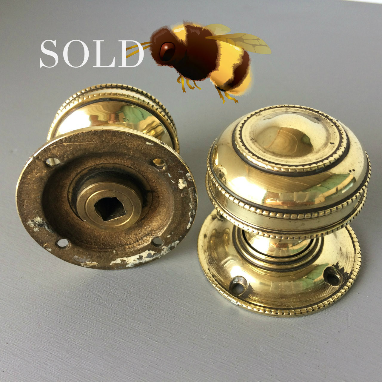 *SOLD* A pair of very decorative heavy brass door knobs / door handles