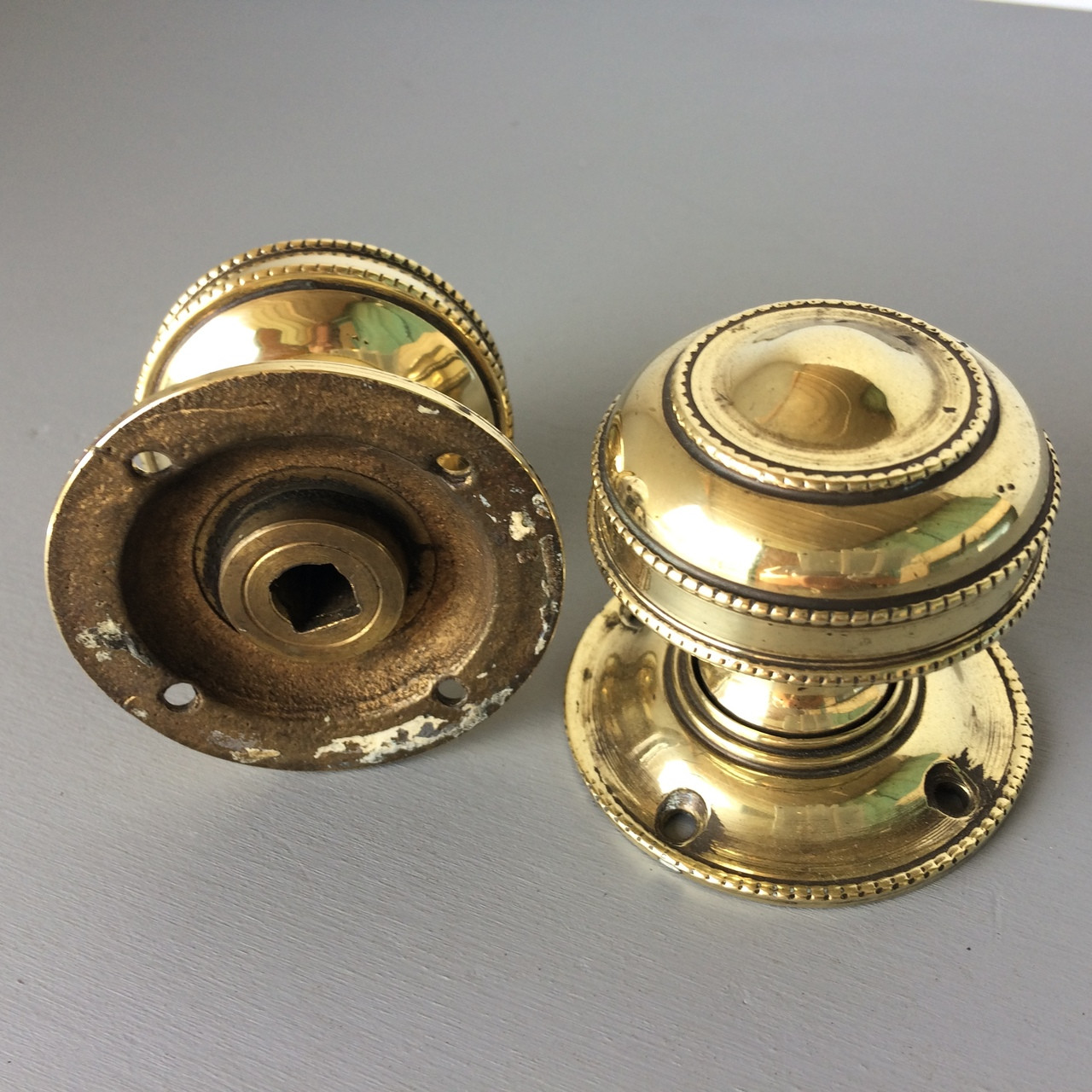 *SOLD* A pair of very decorative heavy brass door knobs / door handles